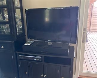 Black console cabinet 
42” wide x 19” deep x 31.5”tall, Phillips 42” tv and Klipsch sound bar