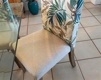 8 chairs with tropical upholstery in perfect condition