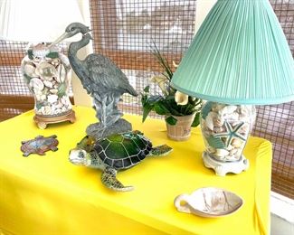assorted lamps: shell-filled, faux coral, glass buoy style, pelican, etc. 