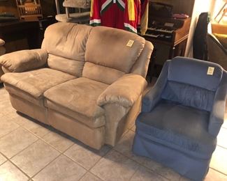 Matching reclining love seat and blue club chair