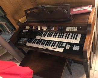 Hiding under the stairs is a Conn 543 Minuet organ