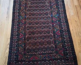 Intricately Designed Persian Rug