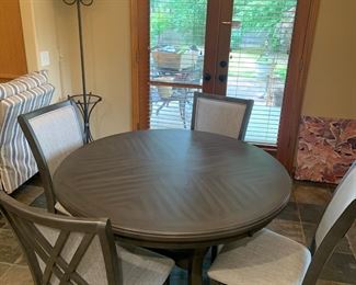 Gray Dining Table with 4 Gray Upholstered Chairs
