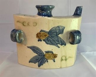 Vintage Japanese ceramic hip flask featuring koi fish