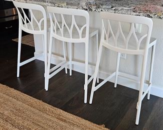 Fun white counter height bar stools from Elements in Cherry Creek