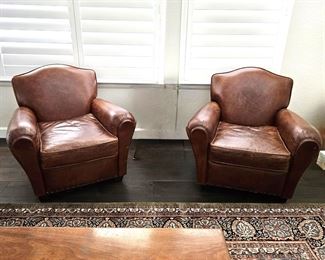 Set of two leather arm chairs