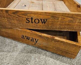 Two large wood drawers on wheels to roll under a bed with extra clothes, etc