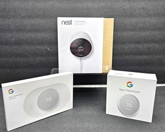 Nest Thermostat, trim kit and outdoor camera, all new in box