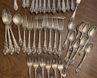 Wallace sterling flatware in the Sir Christopher pattern. A heavy ornate non monogrammed set for 8