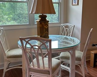 	#90	Rattan and glass top table with 4 chairs 48x30	 $100.00 				