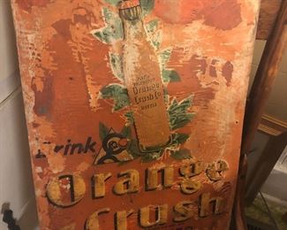 1920’s embossed tin orange crush sign