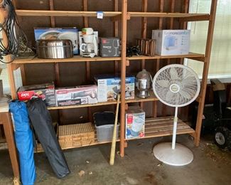 A WALL OF POWER TOOLS , TWO CHAIRS, FAN. ALL LIKE NEW