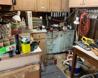 A CORNER WORK SHOP. VERY NICE HARDWARE AND TOOLS. AND CABINET