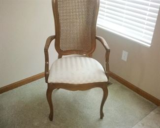 ONE OF THE DINING ROOM CHAIRS THERE ARE 6