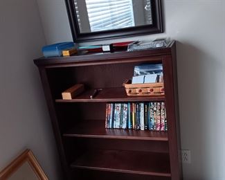 BOOK CASE , MIRROR AND DVDS