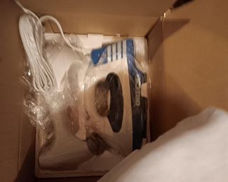 new steam iron in box still sealed