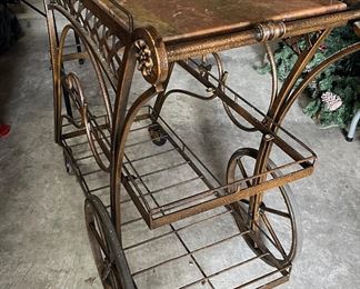 Metal tea cart with ceramic top