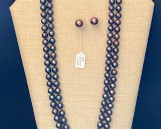 Two strand faux pearl necklace and earrings