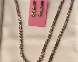 Sterling silver starburst necklace, bracelet, and earrings set