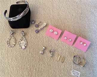 Sterling silver and white topaz teardrop earrings, sterling silver and tanzanite earrings and barrel pendant,  various CZ stud earrings