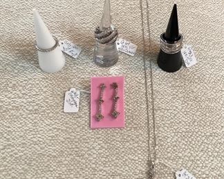 14K eternity band w/diamonds, 14K w/white and Champagne Diamond ring, 14K channel set diamond ring,  Champagne Diamond drop earrings, 14K white gold diamond cross necklace. 