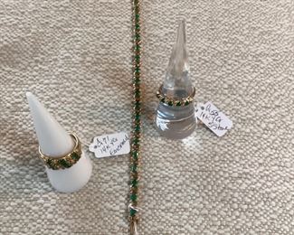 14k emerald ring, tennis bracelet and 5-stone ring