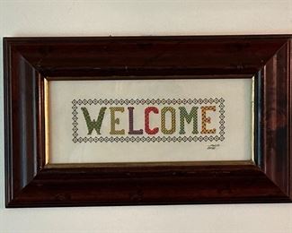Framed cross stitch “Welcome” wall art