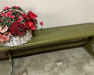 Large green wooden bench