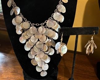Multi-strand mother of pearl stunning she’ll necklace with matching earrings 