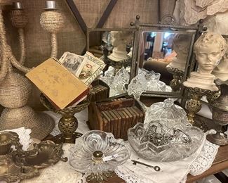 Leather bound miniature Shakespeare books, a beautiful tri-fold vanity mirror, romantic vintage linens, cut glass and more! 