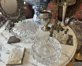 Cut glass, vintage cigarette cases, adorable collection of mini salt shakers and a beautiful tabletop mirror