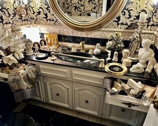 Greco-Roman style busts, the mirror, light fixtures, faucet etc are also available for purchase 