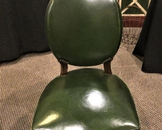 The Green Leather Chairs are in perfect Condition