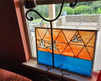 Large Iron Candlestand and older stained glass windowpane