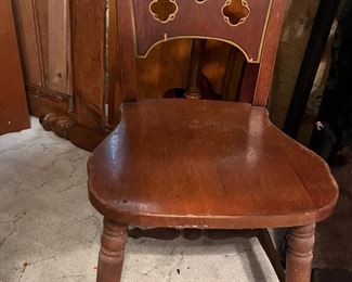 child's chair with cutout back
