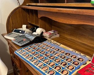 rolltop desk with presidents poster
