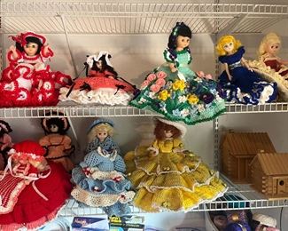dozens of dolls with hand crocheted dresses