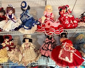 dozens of dolls with hand crocheted dresses
