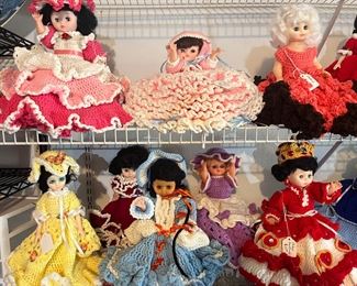dozens of dolls with hand crocheted dresses