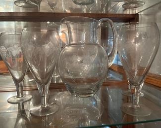 pitcher and stem glasses
