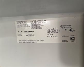 Maytag black side-by-side refrigerator with drawer freezer