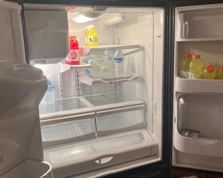 Maytag black side-by-side refrigerator with drawer freezer