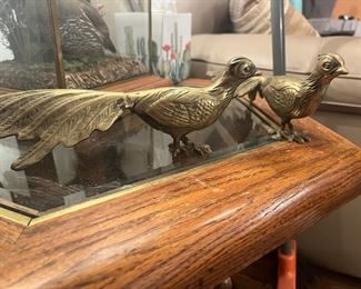 brass peacocks