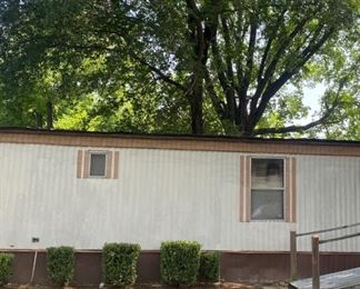 Mobile home w front porch to be moved 