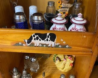 Several salt and pepper shakers 