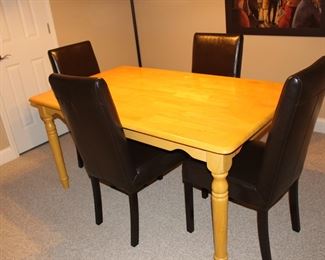 Oak table comes with two matching chairs (these four are sold separately)