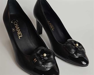 CHANEL Leather Pumps With Flower Accent On Patent Leather Toe