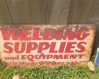 "Welding Supplies and Equipment" metal sign