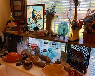 Lots of variety, stained glass cowboy, flowers in boot, and basket, wooden heart bowl, buttermolds, mason jars, coke collection, chip and dip hat. 