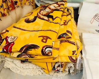 Rectangular and round rare mid century rodeo, horses, brands tablecloths.